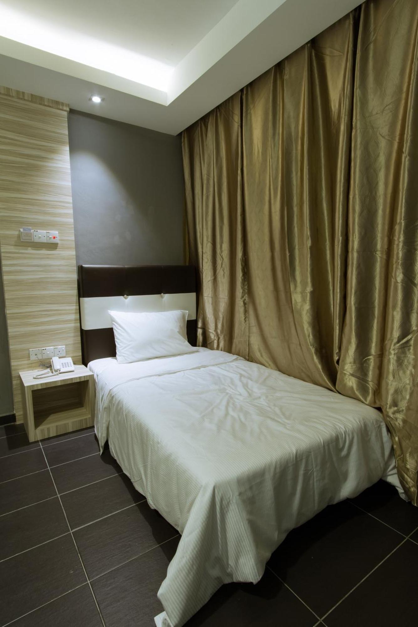 Js Hotel Τζόχορ Μπάχρου Δωμάτιο φωτογραφία